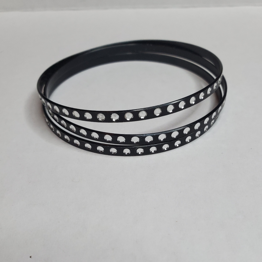Black bangle bracelets with white dots around